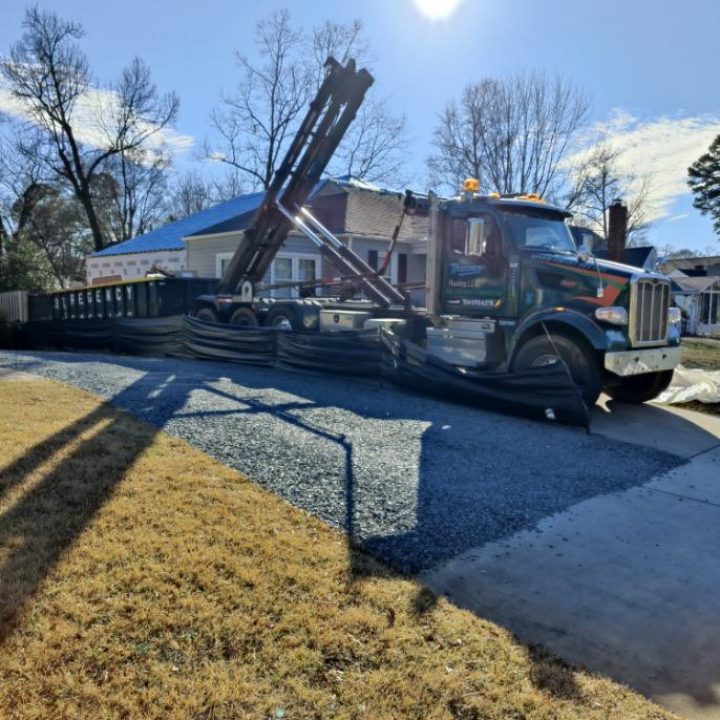 construction roll off dumpster rental truck